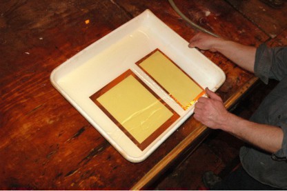 Prior to hot water development the plates are treated with alcohol.